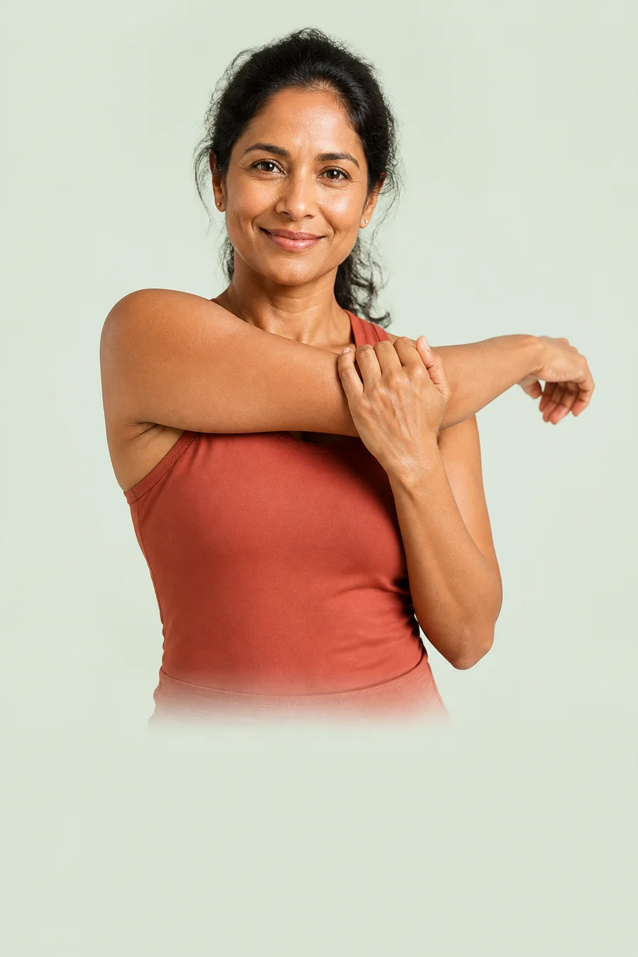 Woman gently stretching her shoulder